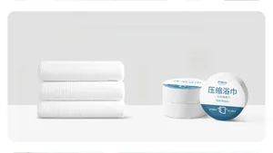 Comparison showing the space-saving compressed and expanded states of the thick bath towel