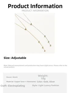 Close-up of adjustable gold and silver rhinestone tassel necklaces in copper plating