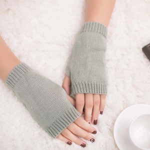 Light sage green knitted fingerless gloves for winter warmth and soft cozy style