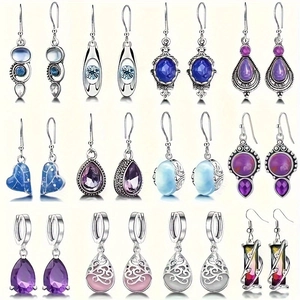 Vintage silver earring set featuring 12 pairs of bohemian crystal teardrop pendants