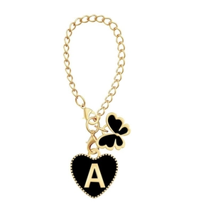 Golden keychain featuring black heart with letter A and butterfly charm on a fine chain