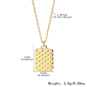 Detail view of a gold square geometric pendant with textured finish and sizing data