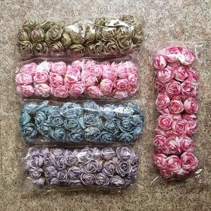Multiple colors of artificial mini silk rose flower heads for DIY crafts and decor