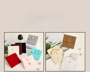 Close-up of colorful microfiber jewelry pouches with secure snap button closure