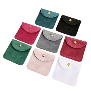Set of 8 colorful plush jewelry pouches with golden metal snap button closure