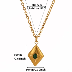 Detail showing dimensions of vintage gold necklace with green gemstone pendant
