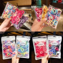 Detailed view of high elasticity colorful hair tie set in transparent jewelry packaging