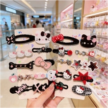 Detailed set of cartoon character hair clips with colorful resin bow and star motifs