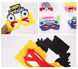 Detail view of colorful felt birthday party glasses with cartoon character designs