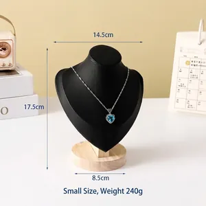 Detailed view of small black necklace display bust with wood base and size dimensions