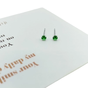 Minimalist S925 silver stud earrings with four-prong set vibrant green round zircon