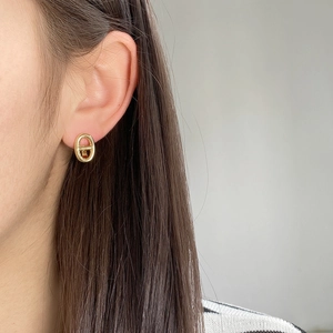 Elegant 925 silver needle hollow pig nose earrings in polished gold finish for women