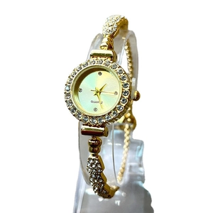 Elegant gold quartz bracelet watch for women with sparkling rhinestones and slim link strap