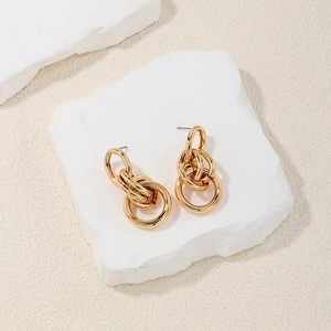 Fashionable gold layered multi-hoop earrings in minimalist geometric metal design