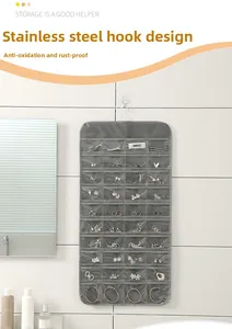 Detail of grey hanging jewelry organizer with stainless steel hook and 40 PVC pockets
