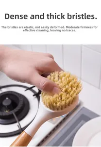 Detail of ergonomic wooden handle kitchen brush with thick elastic bristles for scrubbing