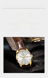 Vue détaillée de la montre à quartz OLEVS dorée avec bracelet en cuir marron luxe