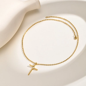 Minimalist gold plated cross necklace featuring a sparkling AAA crystal pendant