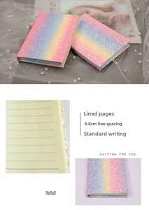 Detail view of rainbow sequin notebook showing 0.8cm ruled paper and shiny hardcover