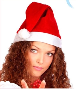 Detailed view of the thick white plush brim and soft red fabric of the classic Santa hat