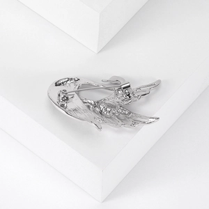 Back view of silver swan brooch showing a secure pin fastening on high-grade metal