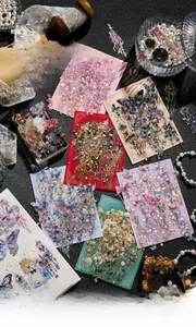 Macro detail of PET stickers with 3D laser gold crystal finish and vintage floral motifs