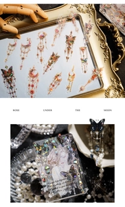 Macro detail of laser gold stickers featuring vintage butterfly and gemstone designs