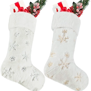 Plush white Christmas stockings with sparkling gold and silver sequin snowflakes