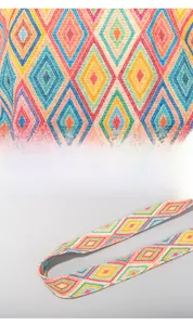 Close-up of bohemian wide shoulder strap featuring geometric patterns and durable weave