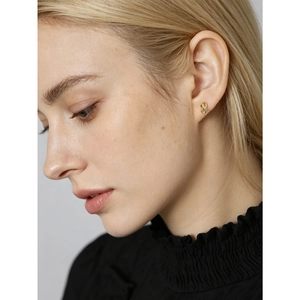Minimalist s925 silver infinity stud earrings with diamonds on a female model