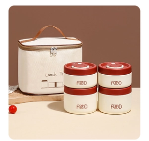 Set of four stainless steel lunch boxes with vacuum lids and an insulated canvas bag
