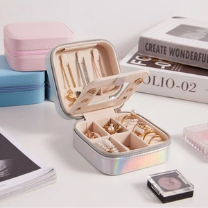 Portable jewelry box with mirror and multiple compartments in iridescent silver finish