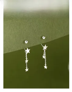 Detail view of S925 silver star tassel earrings featuring screw backs and polished finish