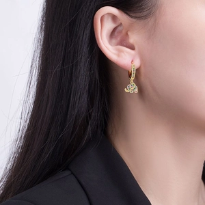 British retro elephant hoop earrings with colorful zircon stones worn by a model