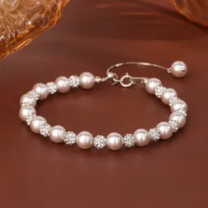 Detail of 925 silver beaded pearl necklace with pave zircon ball beads and adjustable clasp