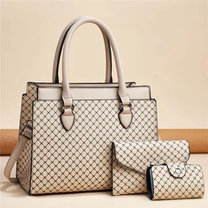 Detailed view of beige 3-piece bag set with black diamond grid pattern and premium PU leather