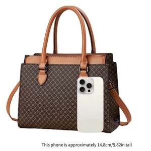 Detail of checkered plaid handbag with adjustable strap and size reference to 5.82in phone