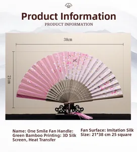 Detail of pink cherry blossom folding fan with bamboo handle and silk surface