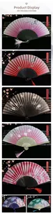 Detail of Chinese silk folding fans with plum blossoms and tassel in vintage style