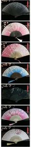 Detailed macro view of seven Chinese silk folding fans with bamboo bones and tassels