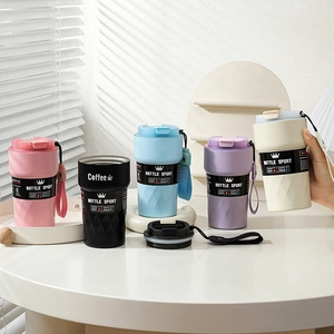 Insulated stainless steel coffee mugs with temperature display and textured grip