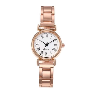 Detail of rose gold quartz watch with white dial and black Roman numeral markers