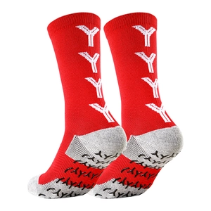 Detail of red athletic crew socks with non-slip silicone grip and breathable mesh