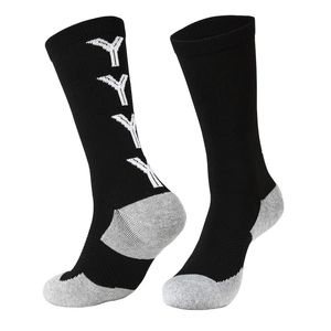 Detailed knit texture of mid-calf football socks with non-slip grips and reinforced heel