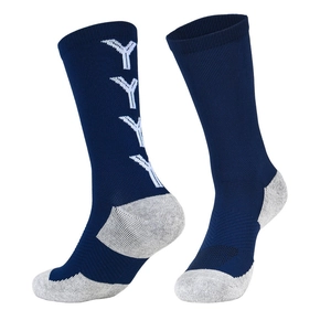 Close-up of navy blue mid-calf soccer socks with grey heel and reinforced towel sole