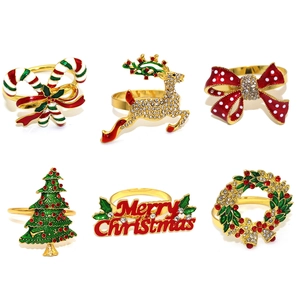 Set of 6 Christmas napkin rings featuring reindeer, trees and festive holiday motifs