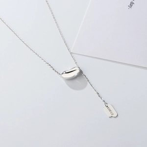 925 sterling silver lucky bean necklace with polished square tag and tassel link chain