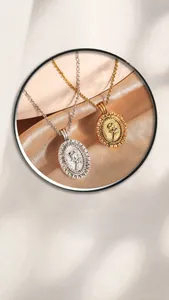 Macro detail of elegant copper rose embossed pendant necklace in gold and silver finish
