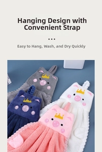 Detail of soft coral fleece hand towels with cute animal embroidery and hanging loops