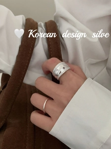 Close-up of S925 sterling silver chunky twist and wheat ear pattern open ring set